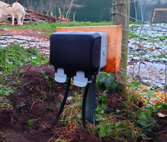 Outdoor Plug Installed To Power an electrical fence for goats