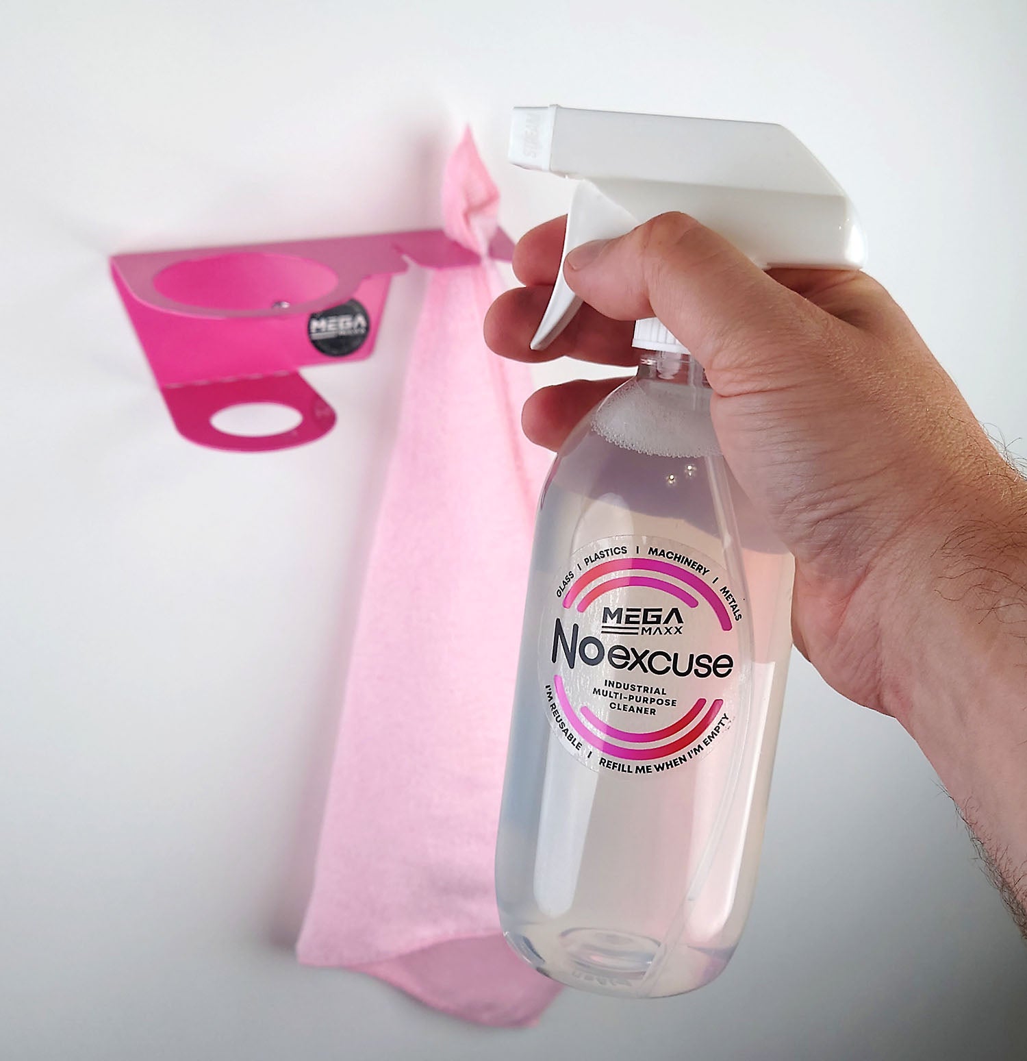 Man removing bottle from No Excuse Cleaning Bracket