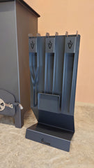 Fireplace Tools Set Stood Next to the Top Loaded Volcann Wood Burning Stove