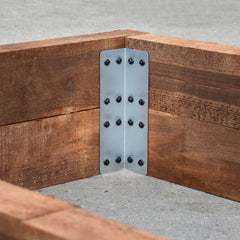 Closeup of the corner detail on the Raised Planter with the Railway Sleeper Bracket Installed.
