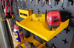 Tape Measure and Spirit Level on Shelf on Nukeson Tool Wall