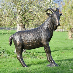 Billy Goat Statue standing in a field