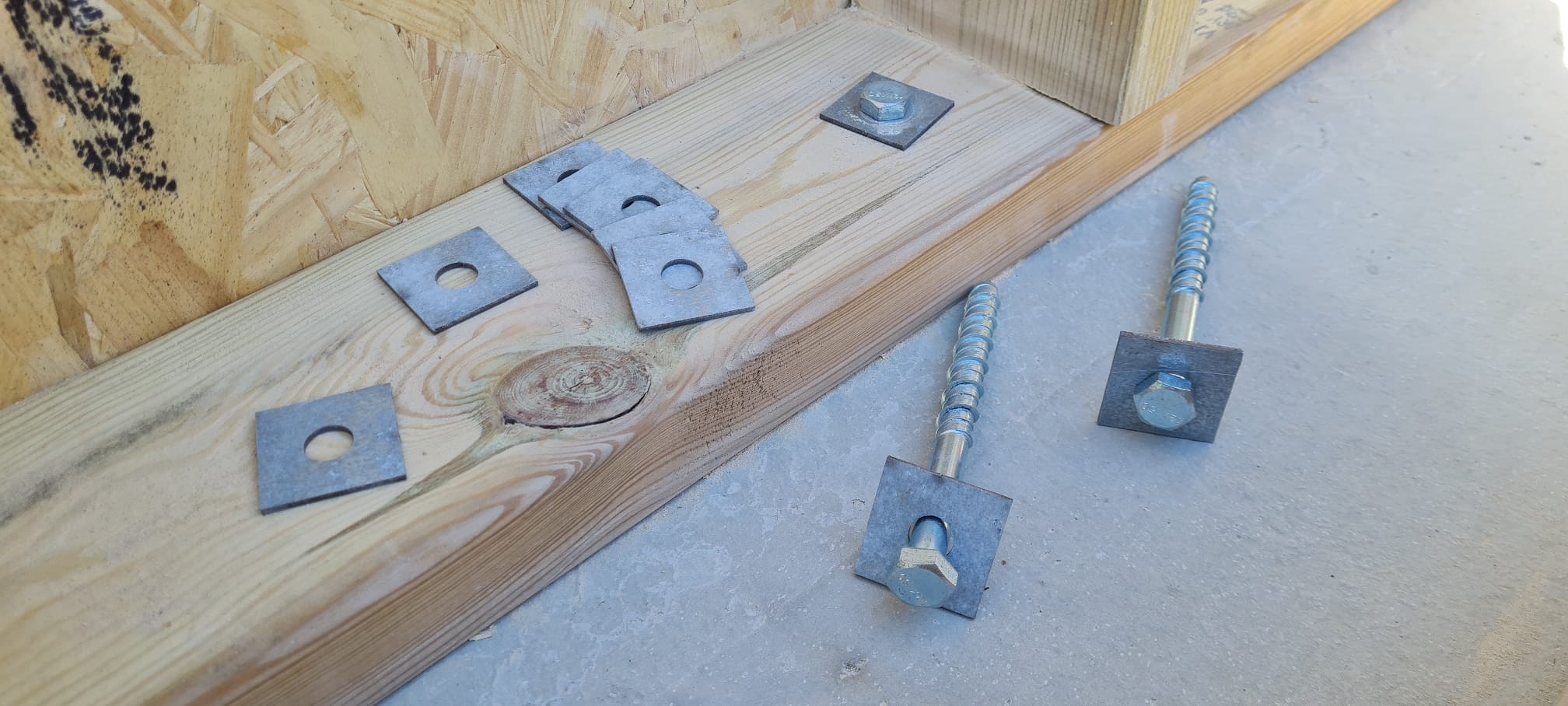 Square Washer on a Bolt being used for Building a House Extension